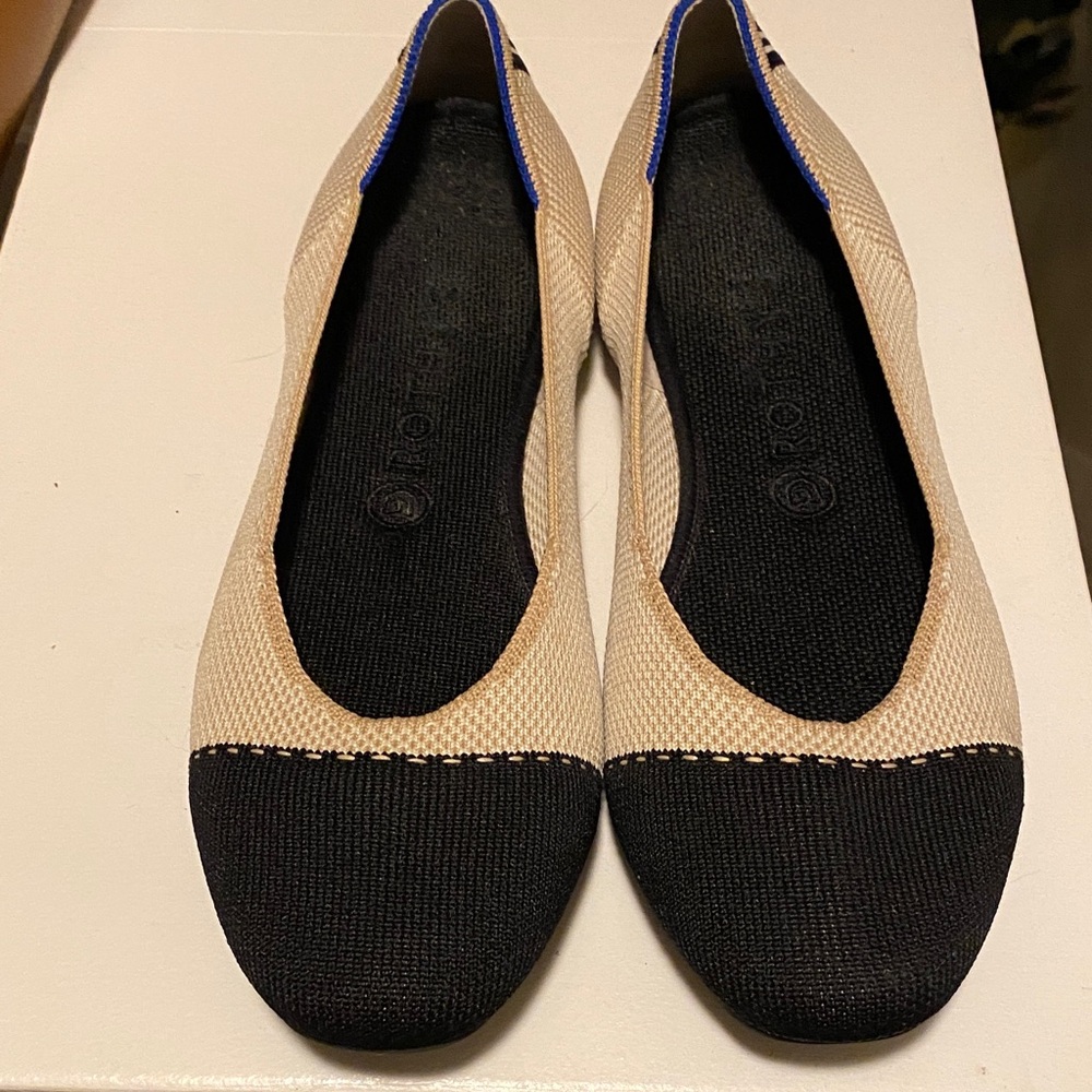 Rothy's Black and Cream Flats with Blue Accents